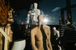 © Elijah Hurwitz - Mannequins visible through glass in a storefront window