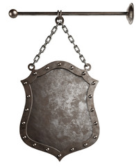 Wall Mural - Medieval metal signboard with chains isolated on a white background. Clipping path included. 3d illustration.