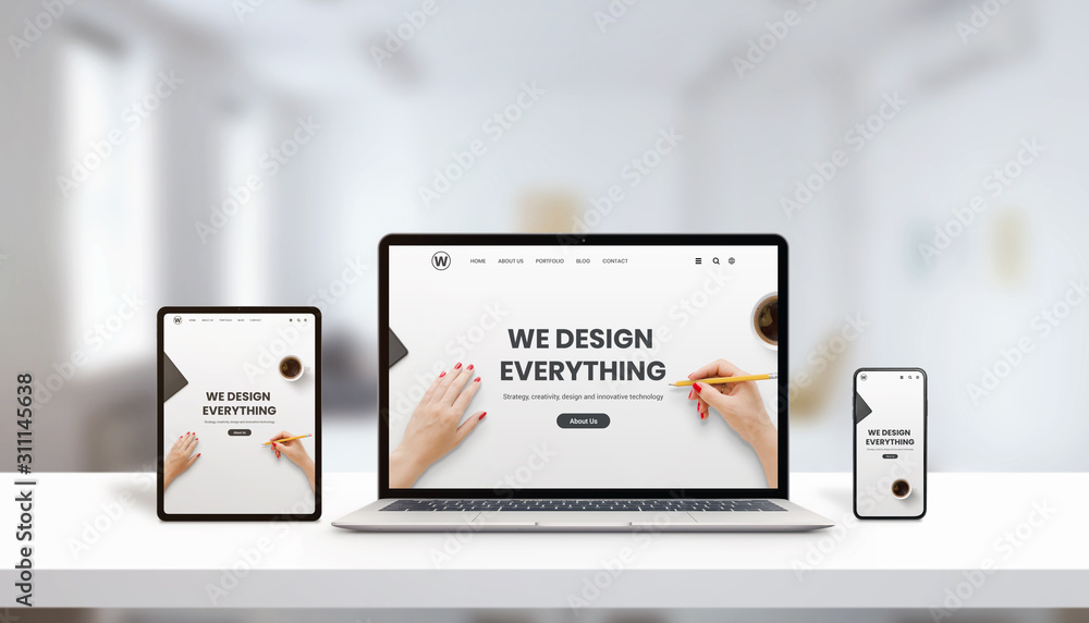 Responsive agency web page on laptop, tablet and phone display concept. Modern, flat web page design. Modern devices with thin edges. Office, studio desk - obrazy, fototapety, plakaty 