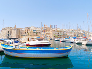 Wall Mural - Beautiful old town in Isla. Next to it is a magnificent port. Malta