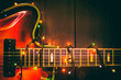 Old, jazz electric guitar with a luminous garland. New Year greeting card for musician, guitarist.