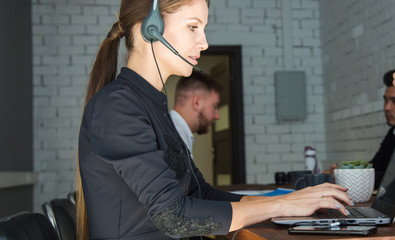 Portrait of woman customer service worker, call center smiling operator with phone on office