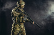 © alfa27 - brave strong and confident man soldier wearing army clothes, green camouflage stand holding gun, ready to shoot