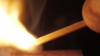 Wall Mural - lighting a match macro shot slow motion