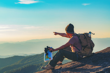 Wall Mural - men traveling with a backpack, hiking in the mountains, travel, travel, lifestyle, success, motivati