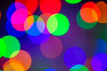 Wall Mural - Close up of unfocused multicolored lights. Unfocused Light background. Blur concept.