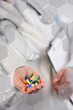 © emiliau - Doctor showing a handful of pills