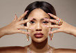 Beauty black skin woman African Ethnic female face. Luxury Young african american model with jewelry, earrings and ring