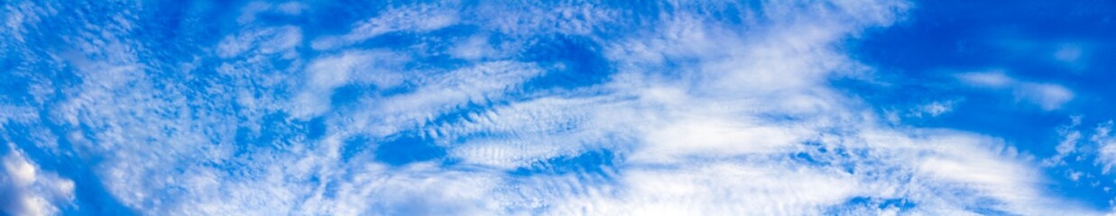 Wall Mural - Panorama blue sky background with tiny clouds