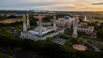 Wall Mural - Aerial landscape of sunrise at The Kota Iskandar Mosque at Iskandar Puteri, Johor State  Malaysia early in the morning