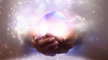 Magic Particles Emanating From Female Hands. Glass Ball In The Hands. Magic Particles On The Palms, Magic, Witchcraft.