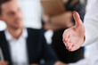 © H_Ko - usinesswoman offer hand to shake hello in office