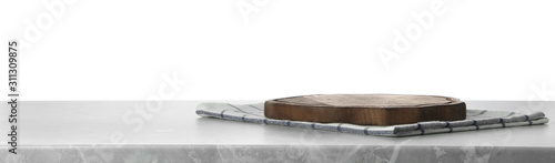Fotografía Folded kitchen towel and cutting board on grey table