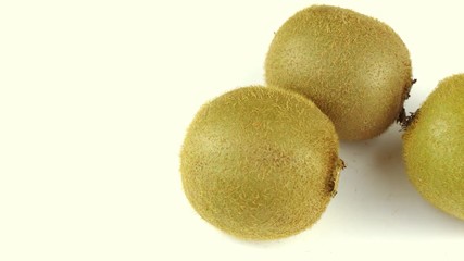 Poster - Several kiwi fruits on a white background