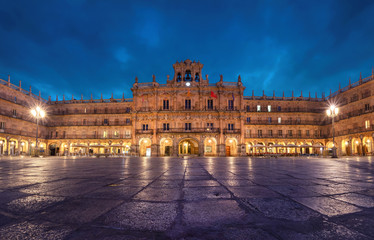 Wall Mural - Salamanca, Spain. View of Plaza Mayor at dusk - 18th-century Spanish baroque public square bordered by shops, restaurants and Town Hall.