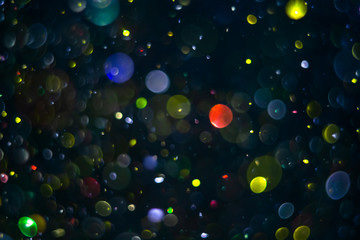 abstract bokeh background, colorful particles