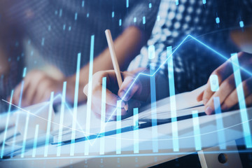 multi exposure of two men planing investment with stock market forex chart.