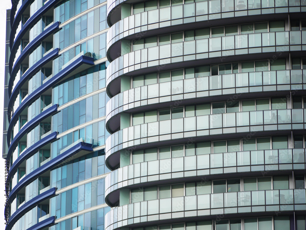 Exterior of high rise residential apartment buildings with glass ...