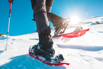 A man in snowshoes.