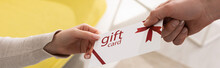 Cropped View Of Man Giving Gift Card To Woman, Panoramic Shot