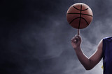Basketball player spinning a ball
