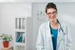 © Suteren Studio - Portrait of Young Woman Doctor with a stethoscope in hospital office