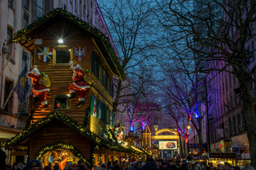 Wall Mural - Christmas shopping on evening's christmas market, Birmingham UK