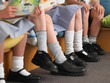 © MDBPIXS - Students Sitting In Row In Classroom