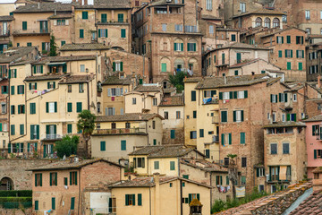 Wall Mural - Pattern houses beackground, Old residential houses in medieval city of Siena, Italy