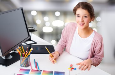 Poster - Woman artist drawing something with a graphic tablet