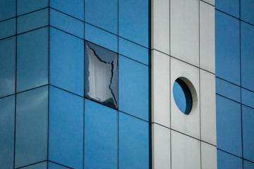 A broken window in an office building