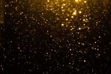 Abstract gold bokeh with black