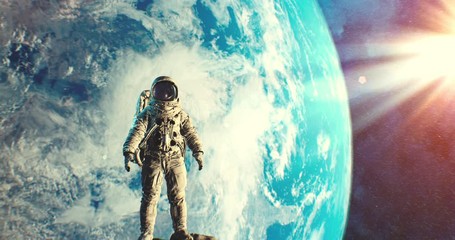 Wall Mural - astronaut armstrong standing on moon surface in space with earth and sun on background
