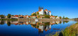 Panoramic view on the Albrechtsburg castle and the Gothic Meissen Cathedral, the embankment and Elbe river on the foreground.