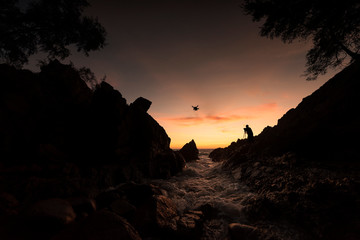 Wall Mural - Beautiful Seascape with sea and rock on sunset background..