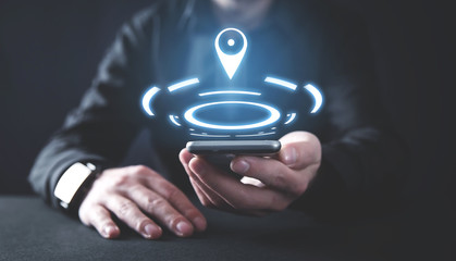 Canvas Print - man holding smartphone. internet, technology. gps concept