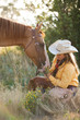 Cowgirl with horse