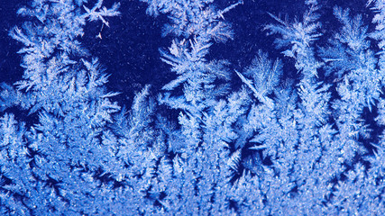  Frosty winter window. Blue Frostwork Background, Ice Crystals on Glass