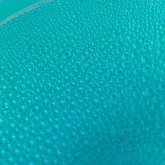 Blue water drops background close up