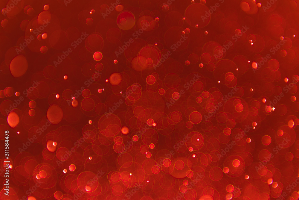Ruby red bokeh background with soft blur bokeh light effect, background bokeh
