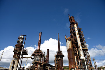 Rusty weathered industrial plant, sky and clouds, Puerto Rico