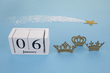 Epiphany Day Concept. 6 January calendar with tree kings crown on blue background