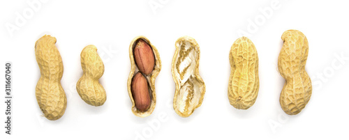 Cuadros en Lienzo Groupe of peanuts in the shell isolated on white background