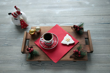  Beautiful Christmas background cookies and cup of coffee on dark background