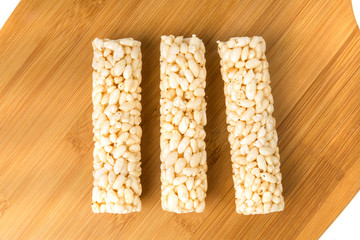 Several puffed plain round rolled rice snacks