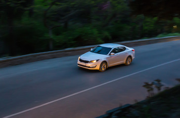 Wall Mural - car moves on the night road.