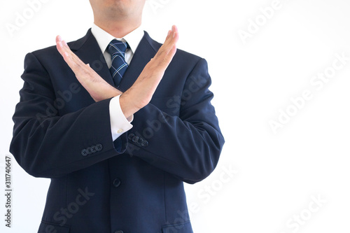 両腕でバツをしているスーツの男性 Stock Photo Adobe Stock 両腕でバツをしているスーツの男性 Stock Photo Adobe Stock