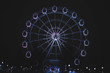 Ferris wheel at night in full height