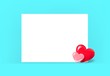Two red hearts on a blue background. Design, greeting card template with empty place for text on a white sheet. Vector illustration, concept for valentines day, wedding