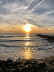 Wall Mural - Couché de soleil sur la plage de Costa da Caparica, Portugal 